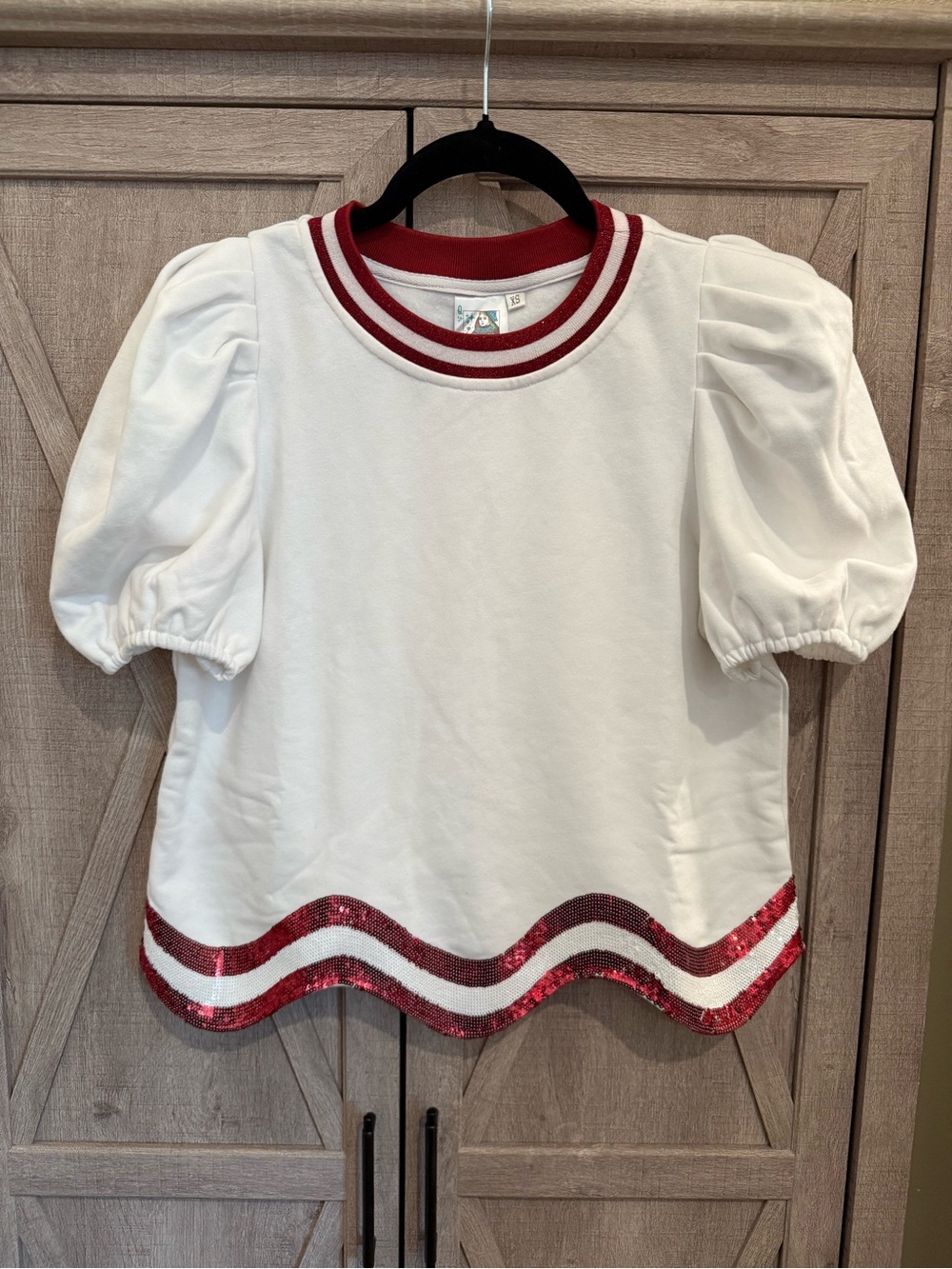 QUEEN OF SPARKLES White Puff Sleeve Tee with Red Trim and Red Sequin Hem
